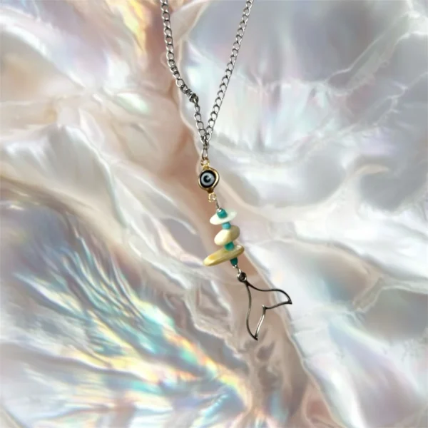 Fishy Gye silver necklace, handmade by Busy Beech from recycled and second-hand materials